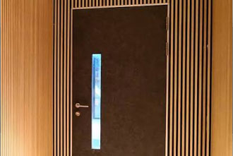 Acoustic wooden door guide for soundproof doors with high STC ratings