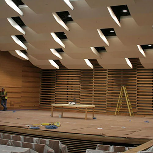 Acoustic wall panels installation for auditorium sound treatment